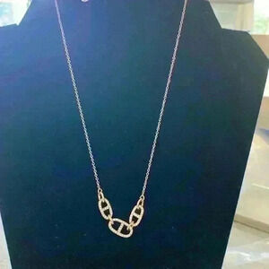 Gold colored necklace